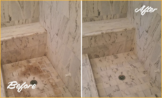 Before and After Picture of a Dirty Bloomsbury Marble Shower Cleaned to Eliminate Dark Stains