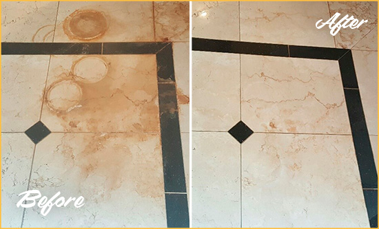 Before and After Picture of a Pluckemin Marble Floor Cleaned to Eliminate Rust Stains