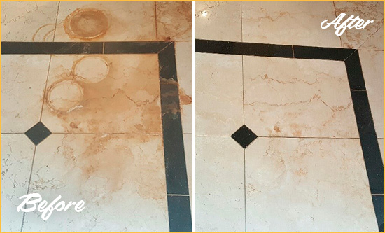 Before and After Picture of a Stockton Hard Surface Restoration Service on a Marble Floor to Eliminate Rust Stains